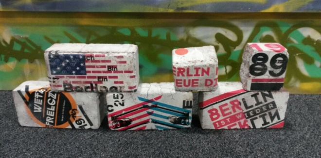 'Bricks from the Berlin Wall' - 25th Anniversary Berlin Wall Fall exhibition, produced by students from Graphic Arts and Design and History, displayed at Leeds Beckett University. Photo © Kelly Hignett.