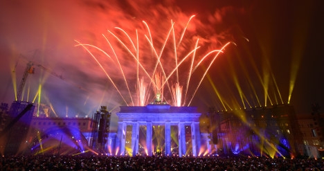 Fireworks at the Brandenburg Gate. Photo © DPA. 