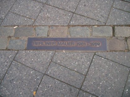 Pavement markers showing the route of the former division still run through Berlin today. Photo  © Kelly Hignett.